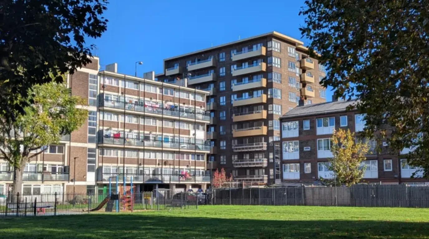Existing St Matthias Estate on Cottage Street in South Poplar with Storey House, Randall House and open grass before landscape regeneration concept visualisation